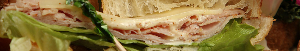 Eating Sandwich at Espresso Yourself Cafe restaurant in Newport, PA.